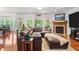 Inviting living room with a fireplace and access to the outdoors at 3005 Buckhorn Rd, Sanford, NC 27330