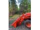 A Kubota tractor is available for land maintenance, ensuring the property remains well-kept and accessible at 3005 Buckhorn Rd, Sanford, NC 27330