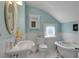 Charming bathroom with vintage fixtures, including a clawfoot tub at 310 Henderson St, Oxford, NC 27565