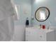 Bright bathroom featuring vanity with storage and modern fixtures at 310 Henderson St, Oxford, NC 27565