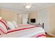 Bright bedroom features a queen-sized bed and door to an adjoining space at 310 Henderson St, Oxford, NC 27565