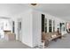 Charming front porch featuring outdoor seating, a side entrance, and a white railing at 310 Henderson St, Oxford, NC 27565