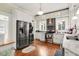 Modern kitchen with stainless steel appliances and custom white cabinetry at 310 Henderson St, Oxford, NC 27565