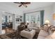 Comfortable living room with built-in shelves and an open layout for modern living at 310 Henderson St, Oxford, NC 27565