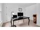 Bright office space featuring neutral walls, dark wood desk, and natural light at 318 Hepowil Trce, Hillsborough, NC 27278