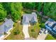 Aerial view of a single-story home with driveway and fenced backyard at 33 Carrington Cir, Angier, NC 27501