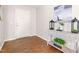 Bright entryway with wood flooring, stylish console table, and modern decor at 33 Carrington Cir, Angier, NC 27501