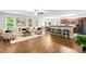 Open-concept living space featuring hardwood floors and ample natural light at 33 Carrington Cir, Angier, NC 27501