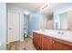 Modern bathroom featuring a double vanity, updated fixtures, and stylish tile flooring at 334 Huckleberry Loop, Mebane, NC 27302