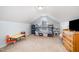 Inviting bedroom with a unique architectural design, comfortable furnishings, and great light at 334 Huckleberry Loop, Mebane, NC 27302