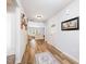 Welcoming entryway featuring hardwood floors, neutral walls, and decorative accents at 334 Huckleberry Loop, Mebane, NC 27302
