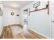 Inviting entryway with modern flooring and decorative wall accents creating a warm atmosphere at 334 Huckleberry Loop, Mebane, NC 27302