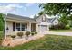 Exterior view of a charming home with a well-maintained lawn and inviting curb appeal at 334 Huckleberry Loop, Mebane, NC 27302