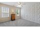 Bedroom featuring soft carpet and patterned wallpaper at 3810 Stoneybrook Dr, Durham, NC 27705