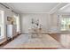 Spacious living area features hardwood flooring, neutral walls, and ample natural light, offering a flexible layout at 3810 Stoneybrook Dr, Durham, NC 27705