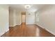 Bedroom featuring hardwood floors, neutral paint, and a window allowing for natural light at 400 Bowling Creek Rd, Chapel Hill, NC 27514