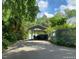 Exterior features a carport, complemented by well-maintained landscaping at 400 Bowling Creek Rd, Chapel Hill, NC 27514