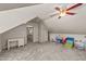 Spacious bonus room featuring neutral carpet flooring and ample natural light at 409 W Holding St, Smithfield, NC 27577