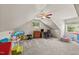 Versatile bonus room with neutral carpet, desk, and windows for natural light at 409 W Holding St, Smithfield, NC 27577