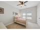 Inviting bedroom featuring a four-poster bed and soft, natural light at 415 Waverly Hills Dr, Cary, NC 27519