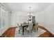 Formal dining room showcasing hardwood floors and traditional decor at 415 Waverly Hills Dr, Cary, NC 27519