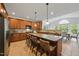 Spacious kitchen features granite countertops, a large island, stainless steel appliances and ample cabinet space at 415 Waverly Hills Dr, Cary, NC 27519