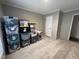 Storage room with boxes stacked and carpeted floors at 420 Spring Ln, Henderson, NC 27537