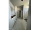 Unfinished bathroom featuring an area for a vanity and a shower with bright natural light at 445 Olivia Crossing Ct # 22, Four Oaks, NC 27524