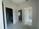 Unfinished room showing multiple doorways offering versatility for the layout of your choice at 445 Olivia Crossing Ct # 22, Four Oaks, NC 27524