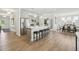 Well-lit kitchen with stainless steel appliances, a spacious island, and breakfast bar seating at 445 Olivia Crossing Ct # 22, Four Oaks, NC 27524