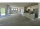 Bright open space showcasing the living room, dining, and kitchen areas, perfect for modern living at 445 Olivia Crossing Ct # 22, Four Oaks, NC 27524