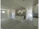 Open-concept living space with ample natural light, ready for customization to your taste at 445 Olivia Crossing Ct # 22, Four Oaks, NC 27524