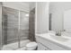 Bathroom features sleek glass shower and stylish fixtures at 46 Waterfall Pointe, Chapel Hill, NC 27517