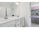 Bathroom featuring double sinks, vanity, and modern fixtures at 46 Waterfall Pointe, Chapel Hill, NC 27517