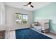 Bright bedroom with ceiling fan, a large window overlooking the neighborhood at 46 Waterfall Pointe, Chapel Hill, NC 27517