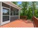 Enjoy outdoor living on this screened porch offering shade and protection from the elements at 46 Waterfall Pointe, Chapel Hill, NC 27517