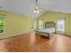 Spacious bedroom with vaulted ceiling, wood floors, and ample natural light at 468 Hay River St, Garner, NC 27529
