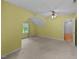 Bedroom with neutral carpet, ceiling fan, and ample natural light at 468 Hay River St, Garner, NC 27529