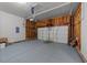 Spacious garage with concrete flooring and wood frame walls, ready for parking and storage at 468 Hay River St, Garner, NC 27529