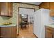View from the kitchen, highlighting open layout to the adjacent dining and living areas at 4701 Brock Dr, Hurdle Mills, NC 27541