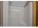 Clean shower stall with built-in seat and modern shower head at 4701 Brock Dr, Hurdle Mills, NC 27541