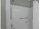 The shower is equipped with grab bars and a handheld shower head at 4701 Brock Dr, Hurdle Mills, NC 27541