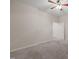 Bedroom with carpet and ceiling fan, and doorway leading out at 4703 Kings Garden Rd, Raleigh, NC 27612