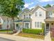 Charming two-story home featuring a stone facade and landscaped front yard, perfect for suburban living at 4703 Kings Garden Rd, Raleigh, NC 27612