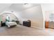 Large bonus bedroom with carpet flooring, sloped ceilings, a desk, and natural light at 494 Asset Pkwy, Sanford, NC 27332