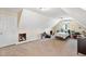 Spacious bedroom features an interesting ceiling line, carpet flooring, and a storage nook at 494 Asset Pkwy, Sanford, NC 27332