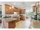 Spacious kitchen with wooden cabinets, tiled floor, and modern appliances providing both functionality and style at 494 Asset Pkwy, Sanford, NC 27332