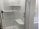 The modern shower features a bench, glass doors, and sleek hardware at 502 Burton St, Fuquay Varina, NC 27526
