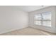 Serene bedroom featuring neutral carpet and a large window with natural light at 505 Lochalsh Dr, Gibsonville, NC 27249