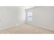 Comfortable bedroom featuring neutral carpet and a window providing natural light at 505 Lochalsh Dr, Gibsonville, NC 27249